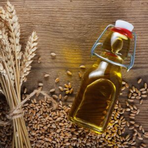 Bottle of wheatgerm carrier oil rich in vitamin E for skin and hair nourishment